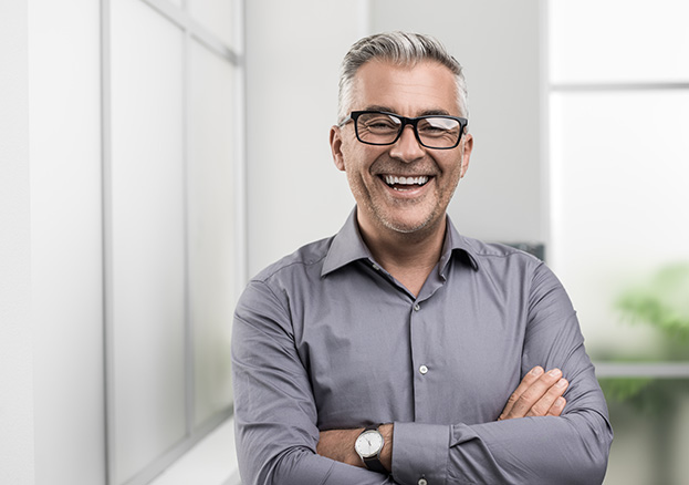 older man smiling at camera